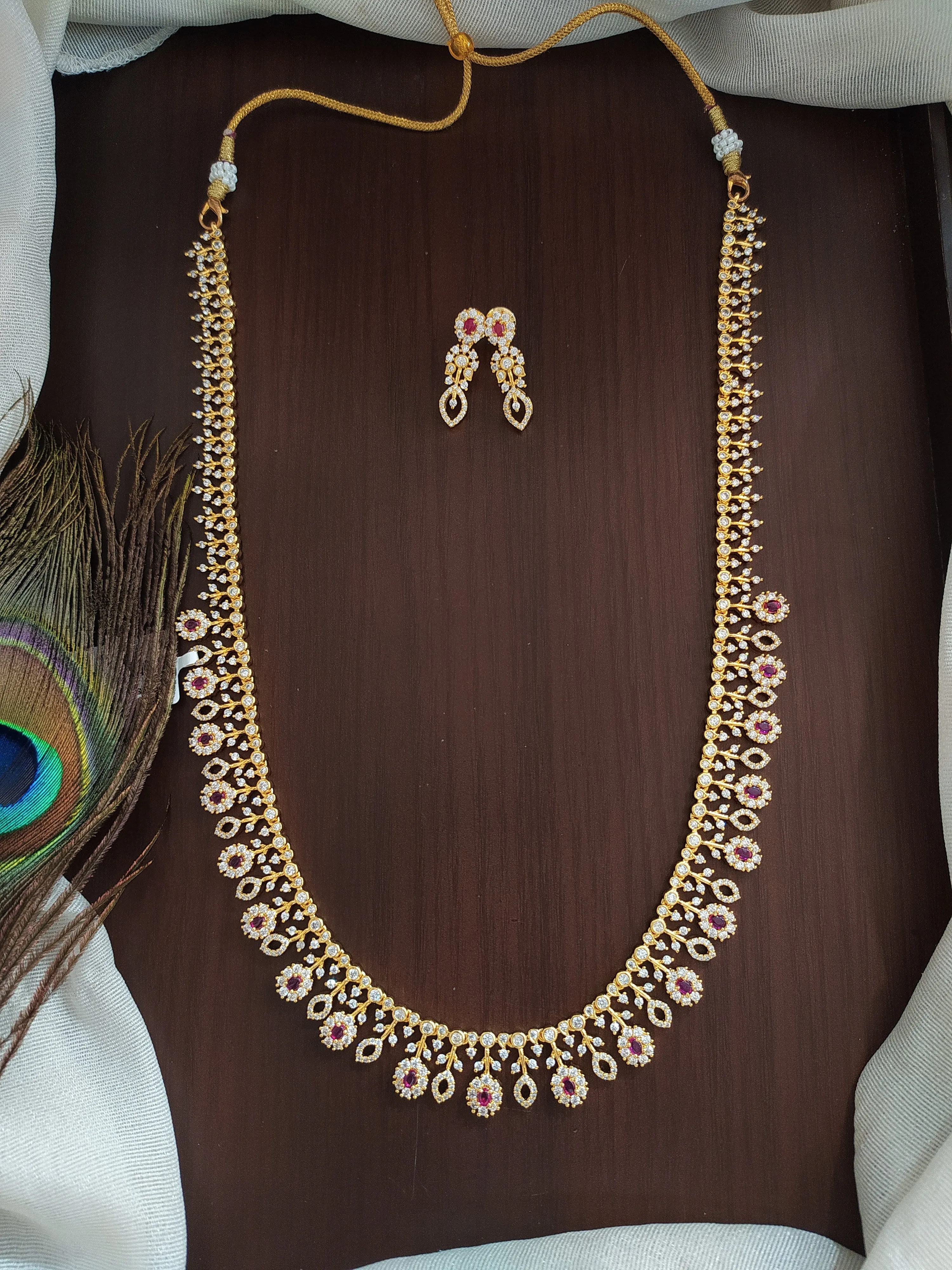 Alluring Floral Design Zircon Long Set in Green, Ruby and Blue