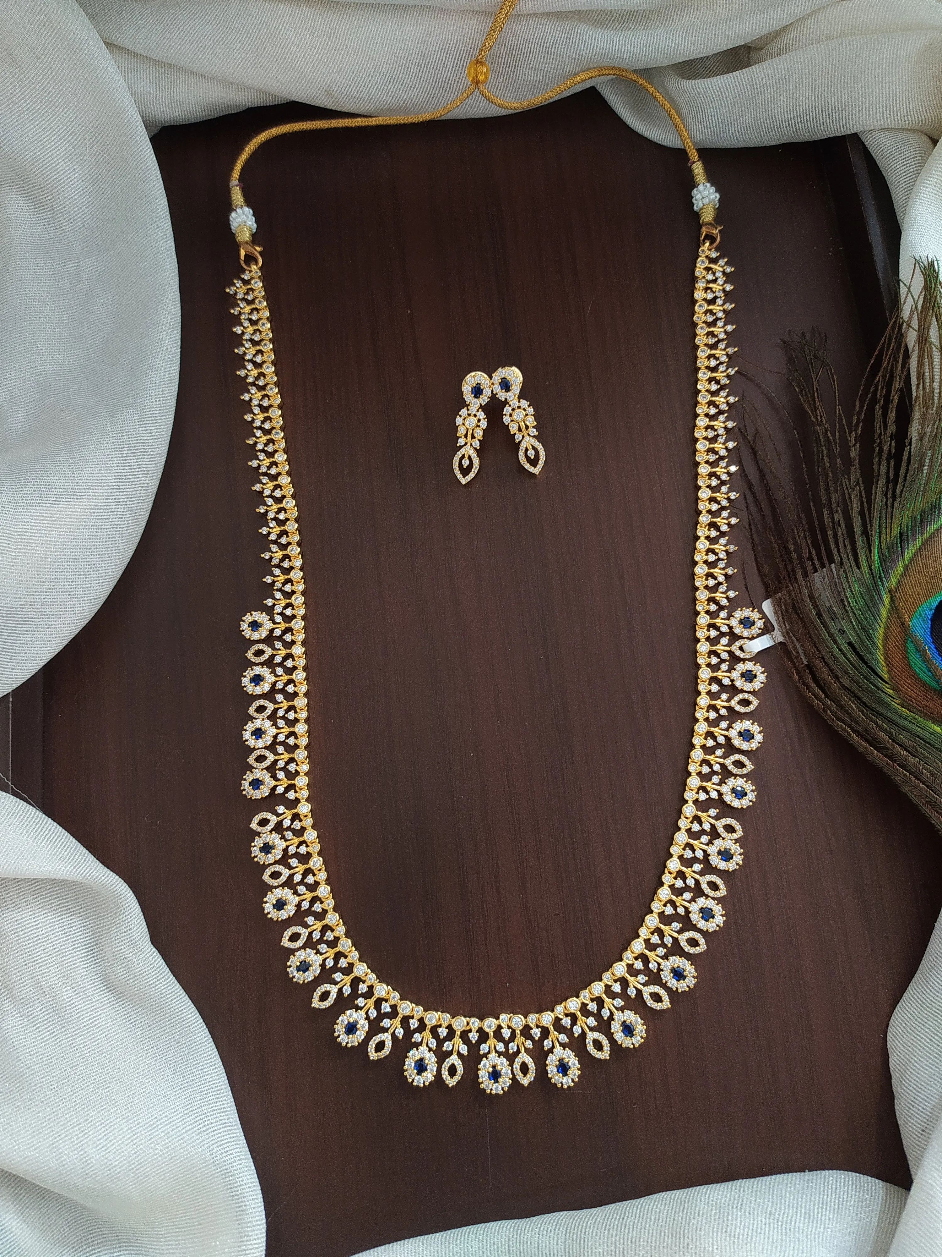 Alluring Floral Design Zircon Long Set in Green, Ruby and Blue