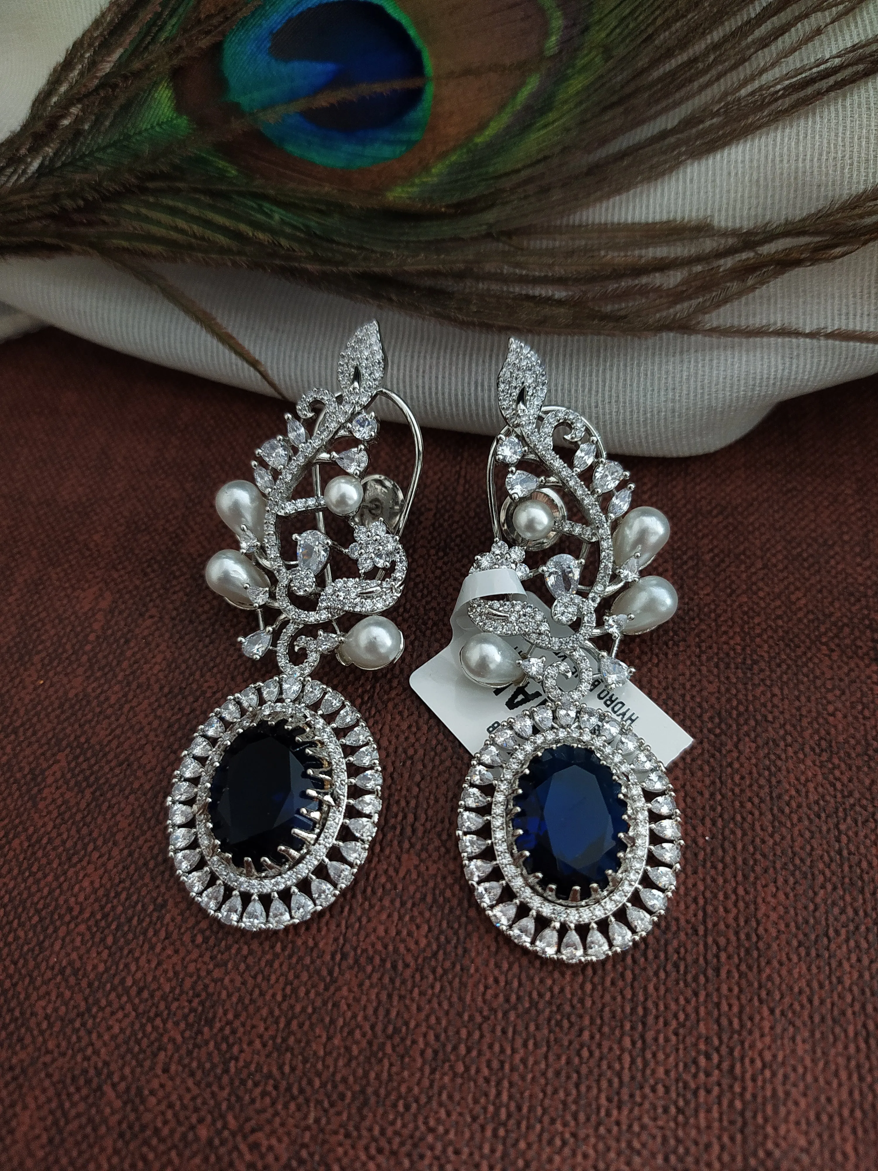 Alluring Zircon Dangler Earrings