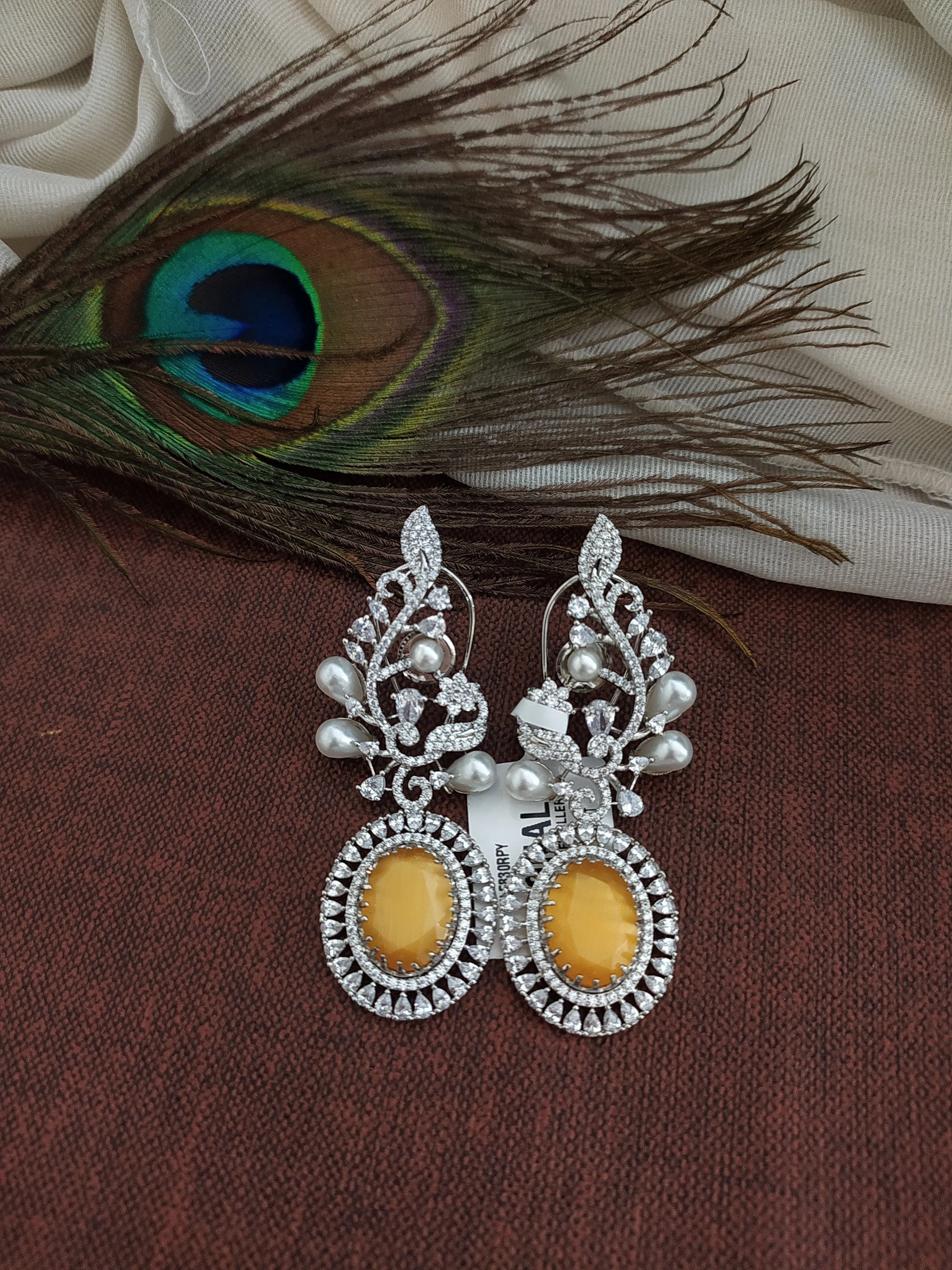 Alluring Zircon Dangler Earrings