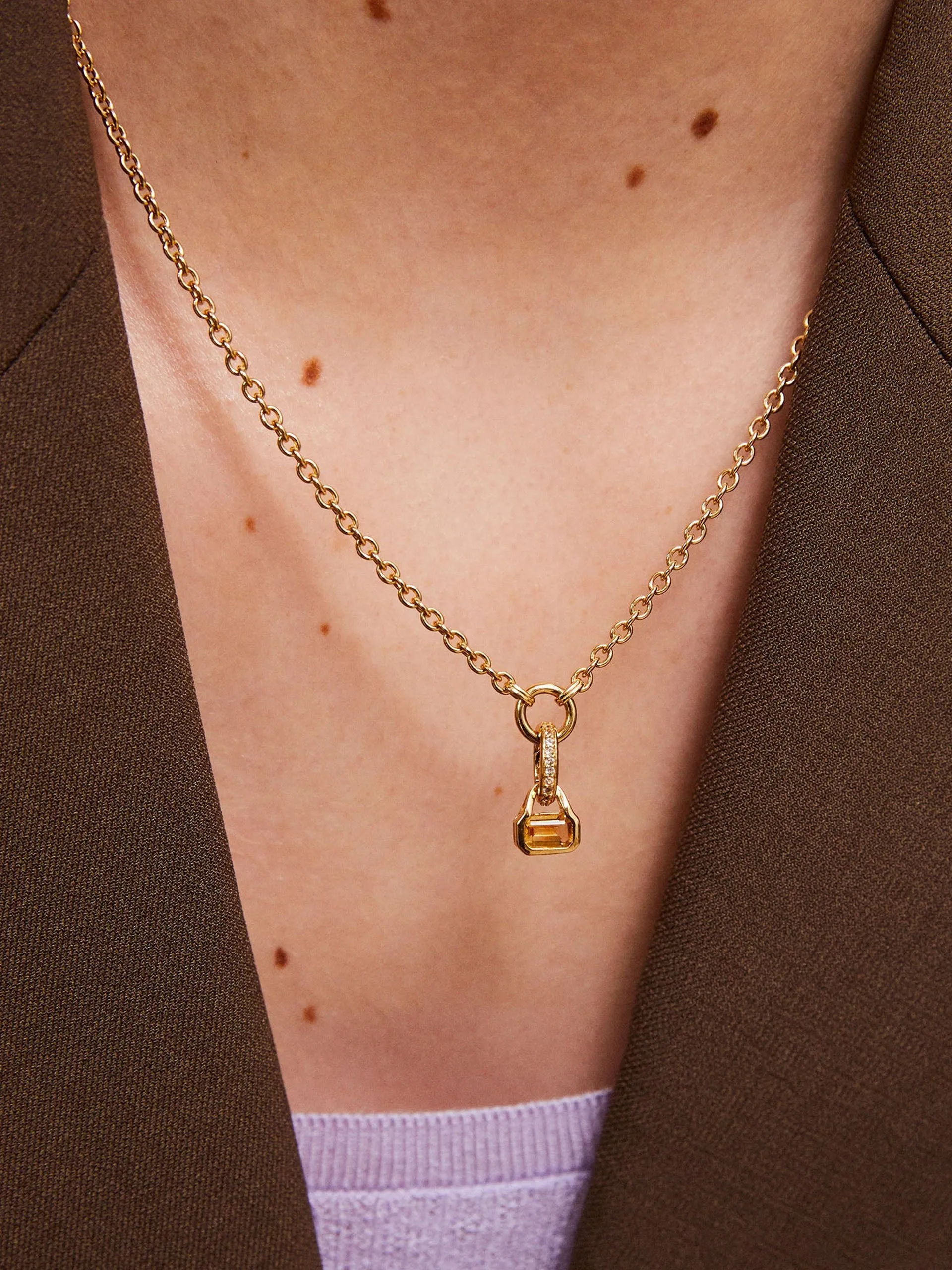 Citrine charm on carrier chain
