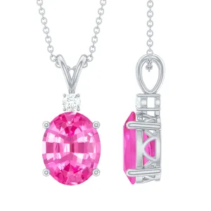 Oval Created Pink Sapphire Solitaire Pendant with Dainty Moissanite