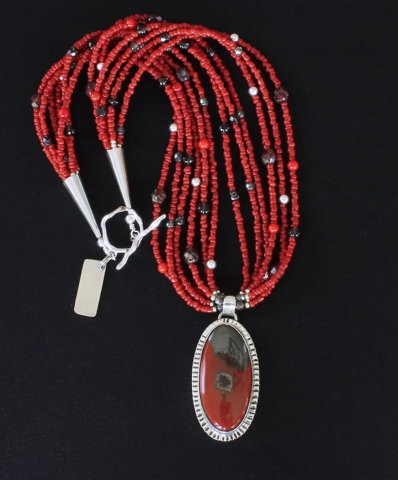 Rainbow Brecciated Jasper and Sterling Silver Pendant with 6 Strands of Red Pote Beads, Smoky Quartz Rondelles, Czech Glass and Sterling Silver