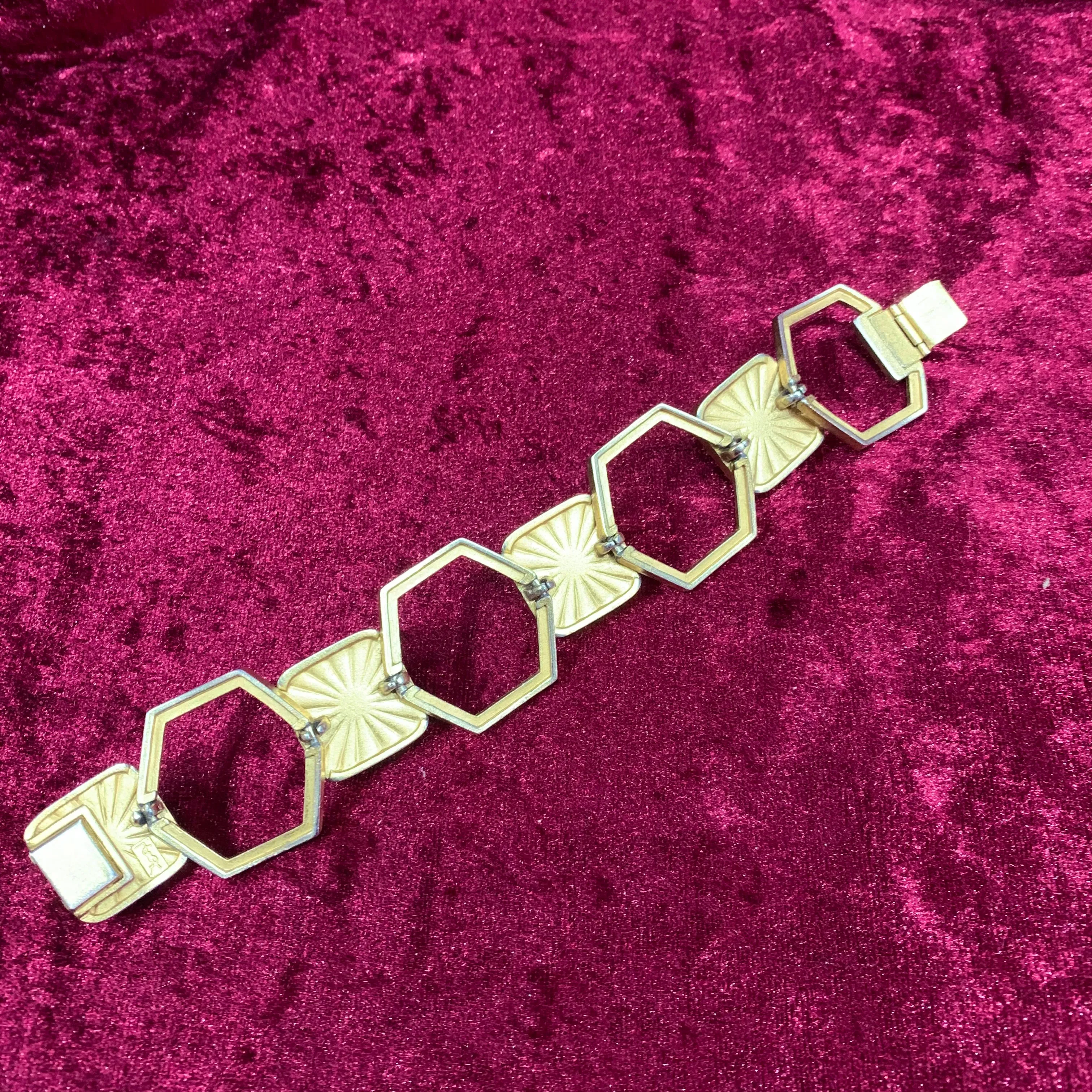 Yves Saint Laurent purple bracelet